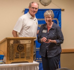 Club president Rod Roberts presents Barb Lintner her second Paul Harris. She is a sustaining member.